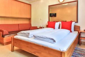 Postel nebo postele na pokoji v ubytování Hotel Pension Residence