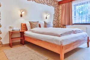 Postel nebo postele na pokoji v ubytování Hotel Pension Residence