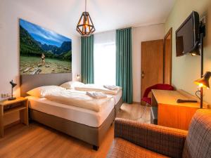 Postel nebo postele na pokoji v ubytování Schlafmeile Traunsee