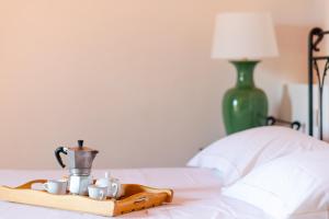 A bed or beds in a room at Taglialegna a Montefiorile