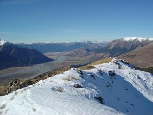 a snow covered mountain with a view of a valley at Arthur's Pass Alpine Motel in Arthur's Pass