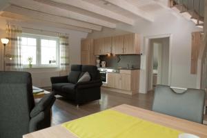 Kuchyň nebo kuchyňský kout v ubytování Ferienwohnung Lühe