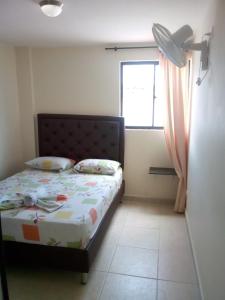 Postel nebo postele na pokoji v ubytování Hotel Táchiras