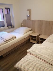 Postel nebo postele na pokoji v ubytování Greenments, Apartments für Freizeit und Beruf