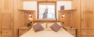 Postel nebo postele na pokoji v ubytování Hotel Capriolo