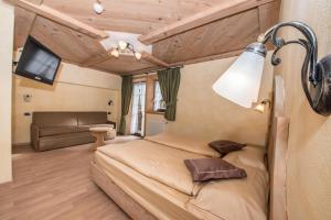 TV a/nebo společenská místnost v ubytování Hotel Capriolo