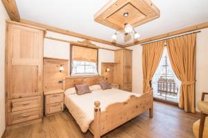 Postel nebo postele na pokoji v ubytování Hotel Capriolo