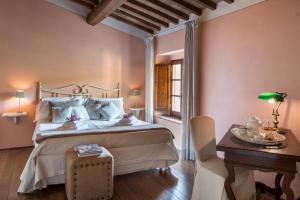 Voodi või voodid majutusasutuse Borgo I Vicelli Adults Only Relais toas