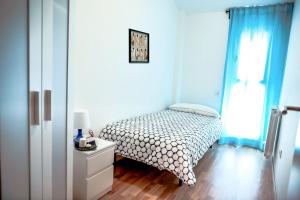 Cama o camas de una habitación en Apartamentos Turísticos Andorra Plus