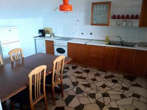 Kuchyň nebo kuchyňský kout v ubytování Apartment Dare