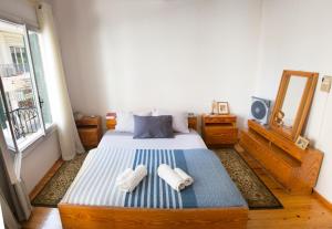 Artistic Getaway Home - Super Central客房内的一张或多张床位