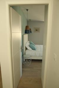 Postel nebo postele na pokoji v ubytování Roscoff Beach House