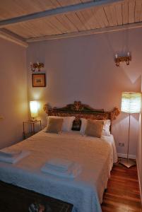 Ένα ή περισσότερα κρεβάτια σε δωμάτιο στο Casa Arezzola