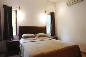 Voodi või voodid majutusasutuse Villas Macondo toas