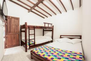 Postel nebo postele na pokoji v ubytování Vivienda turística mi sueño Jardín