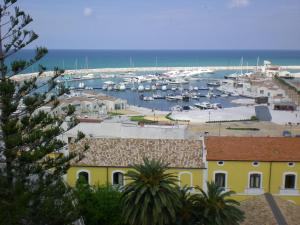 a view of a harbor with boats in the water at Residence Ducale in Rodi Garganico