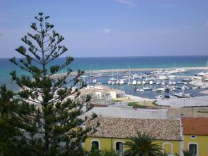 a view of a marina with boats in the water at Residence Ducale in Rodi Garganico