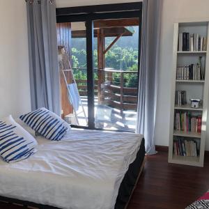 Postel nebo postele na pokoji v ubytování La Villa Te Fetia Nui Moorea