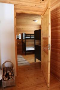 an open door to a room with a bunk bed at Youth Center Vasatokka in Inari