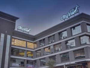 a rendering of the front of a building at Hotel City Inn in Gandhinagar