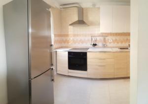 A kitchen or kitchenette at Apartamento Pargue Tropical