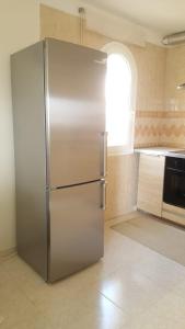 A kitchen or kitchenette at Apartamento Pargue Tropical