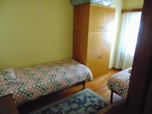 Posteľ alebo postele v izbe v ubytovaní Alloggio in centro a Cervinia