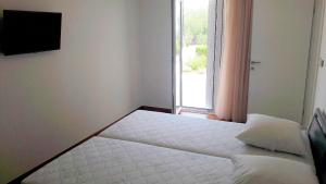 Cama o camas de una habitación en Apartments Panoramic View