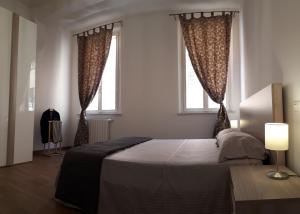 Katil atau katil-katil dalam bilik di La Campanella