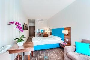 Posteľ alebo postele v izbe v ubytovaní Apartamenty AmberHome