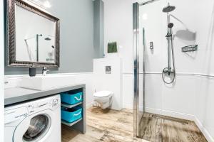 Kúpeľňa v ubytovaní Apartamenty AmberHome