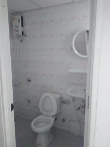 Koupelna v ubytování Tisaraporn Resident
