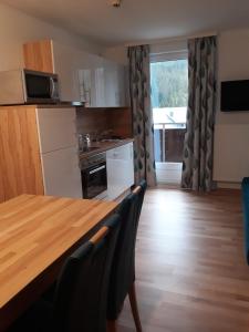 Kuchyň nebo kuchyňský kout v ubytování Ferienwohnung Ski-Hans