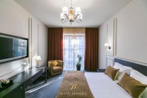 TV a/nebo společenská místnost v ubytování Bon Hotel