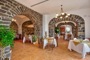 A restaurant or other place to eat at Agriturismo La Peppina