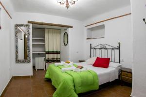 Cama o camas de una habitación en Cuevas El Moral
