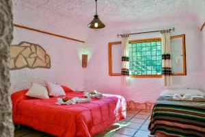Cama o camas de una habitación en Cuevas El Moral