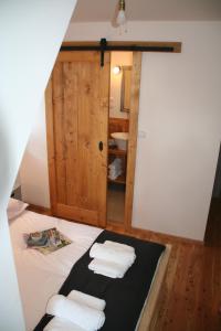 Postel nebo postele na pokoji v ubytování Willa Ubocz