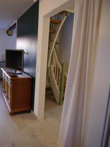 TV a/nebo společenská místnost v ubytování Kunst und Meer