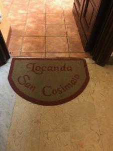 a welcome mat on the floor of a kitchen at Locanda San Cosimato in Rome
