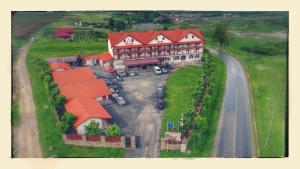 an overhead view of a large house with red roof at motel cryss in Ocna Sibiului +2 photos