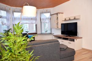 Ferienapartment Süderstrasseにあるテレビまたはエンターテインメントセンター