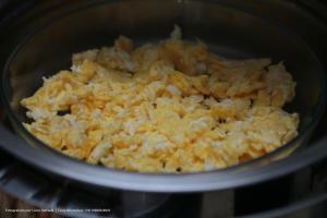 a pot full of food in a stove at Hotel Princeton in Piracicaba