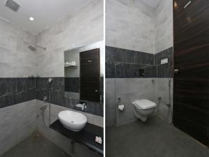 Koupelna v ubytování Amora Rooms Dwarka