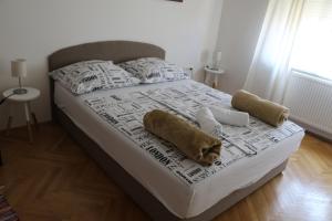 Posteľ alebo postele v izbe v ubytovaní Apartment K&A- near Dom sportova
