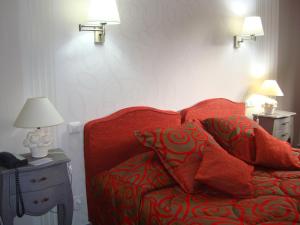 Posezení v ubytování Hôtel Le Gue Du Holme