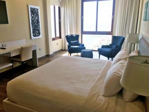 Postel nebo postele na pokoji v ubytování Satama Hotel + 34 fotografií