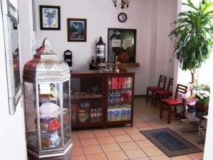 a room with a store with a room with a counter with a room at Hotel Don Pedro Centro in Villa de Tamazulapan