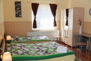 Postel nebo postele na pokoji v ubytování Willa Mewa