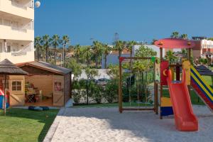 a playground with a slide and a play structure at Interpass Vau Hotel Apartamentos in Portimão